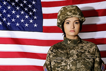 Female soldier with USA flag on background
